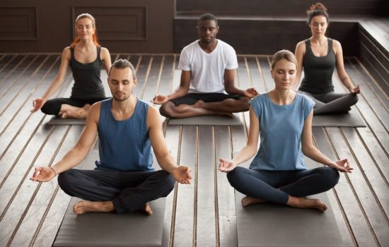 group-young-yogi-people-sitting-sukhasana-exercise (1)